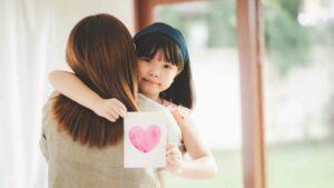 Girl hugging her mom